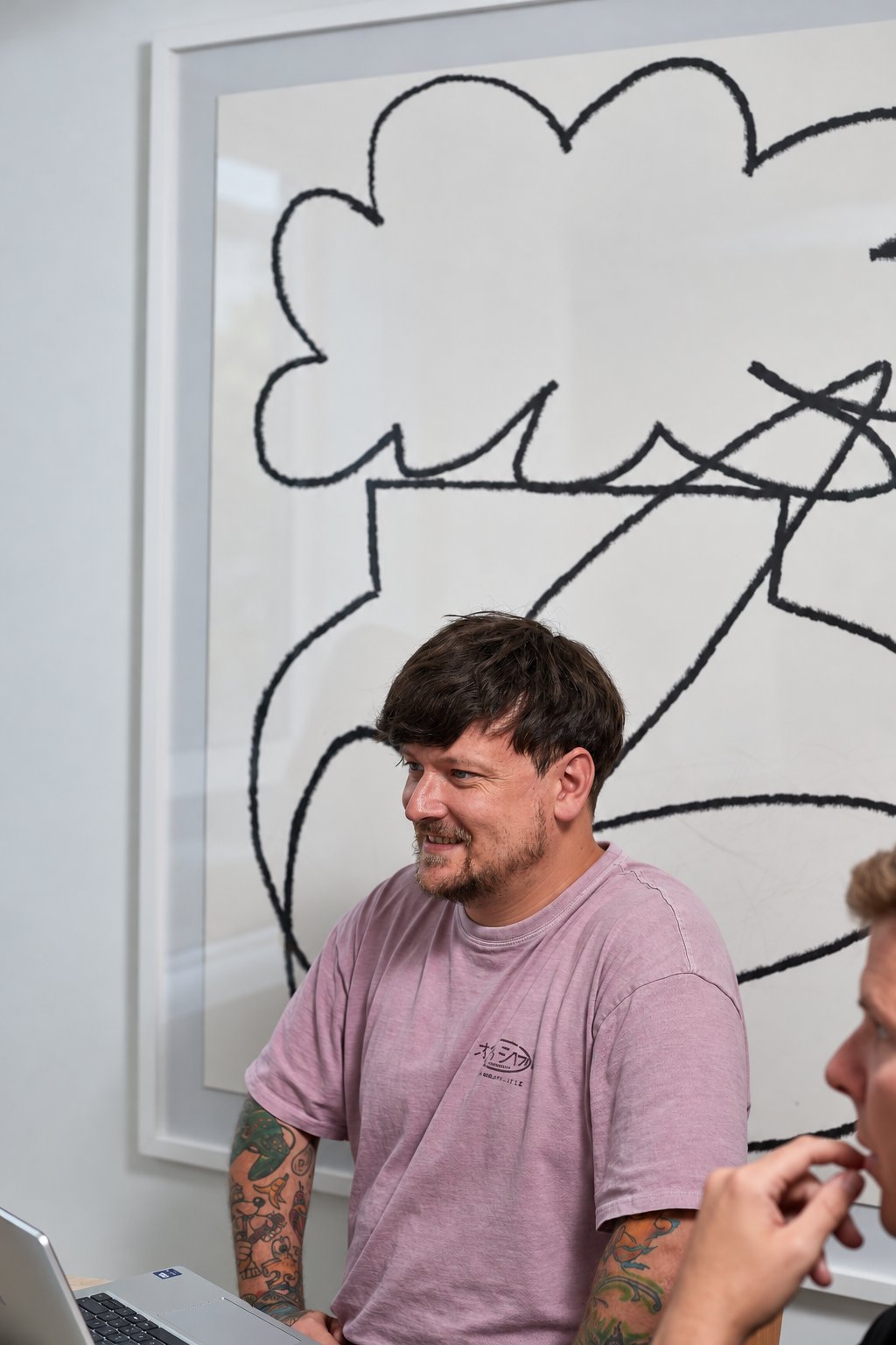 Rhys at work with the team